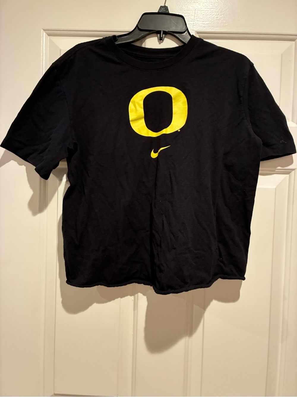 Nike Men's Black T-Shirt with Yellow 'O' Logo